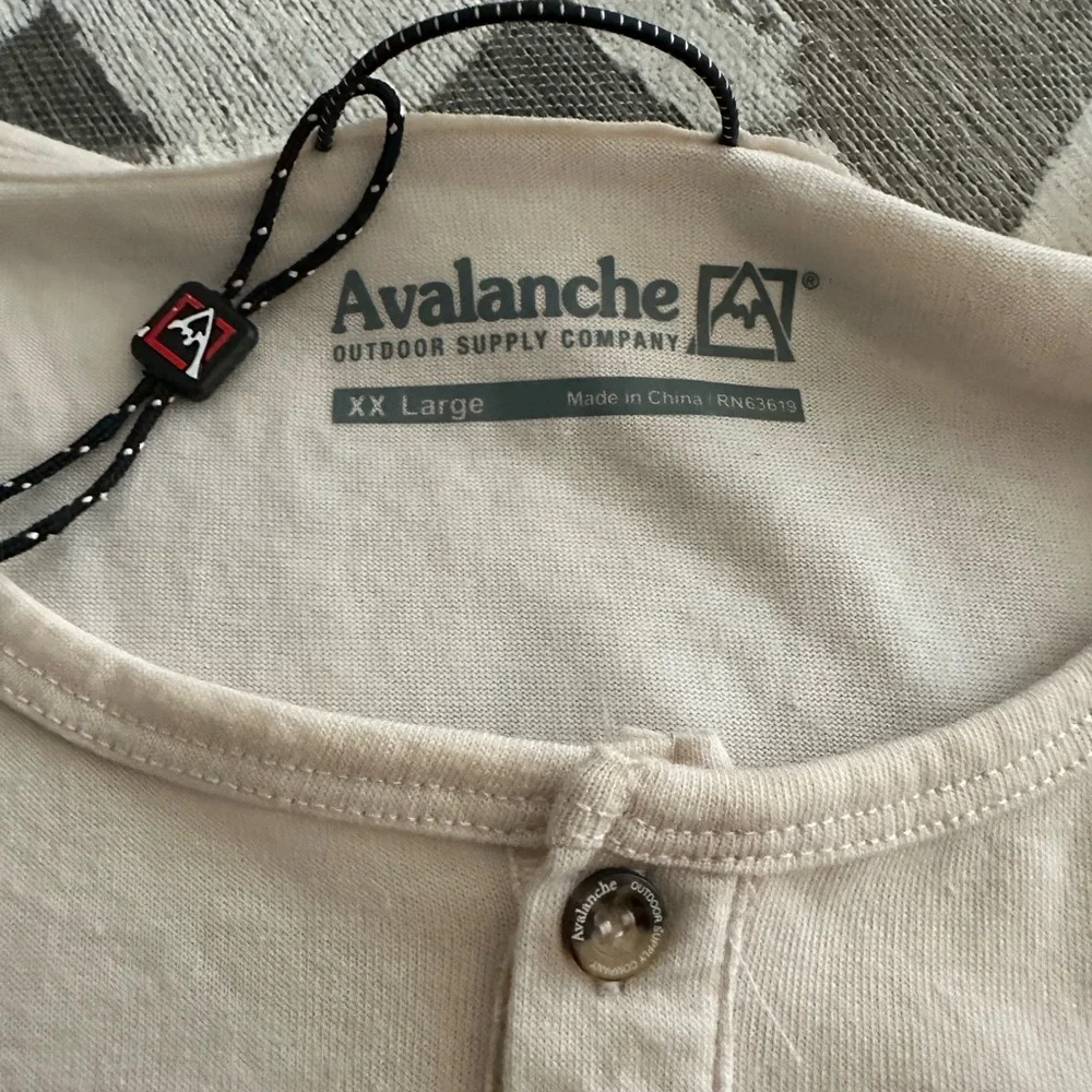 Avalanche Cream and Black Short Sleeve Tee